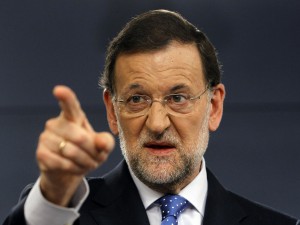 Spain's PM Rajoy gestures during a news conference at Madrid's Moncloa Palace